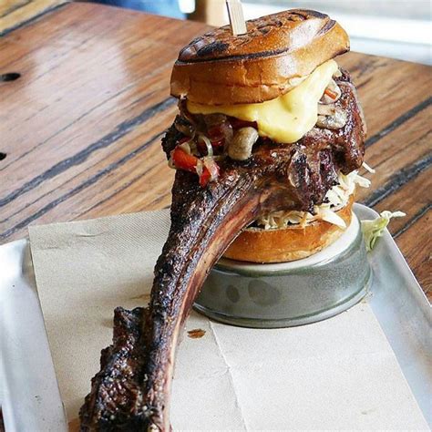 Londons MONSTER Tomahawk Steak Burger an ENTIRE Steak on a Bun 100 Foods to Eat Before You Die